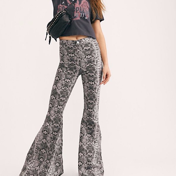 Free People Denim - Free People Just float on snake print flares